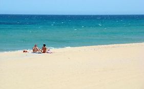 bungalow en la playa y piscina